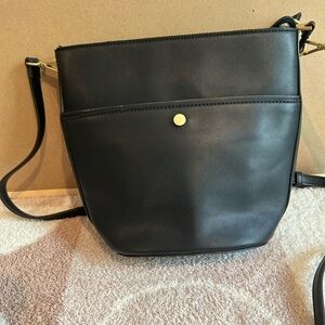 Black cross body bag made by soul society